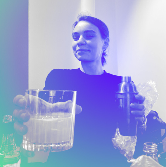Polina from DUX serving a cocktail
